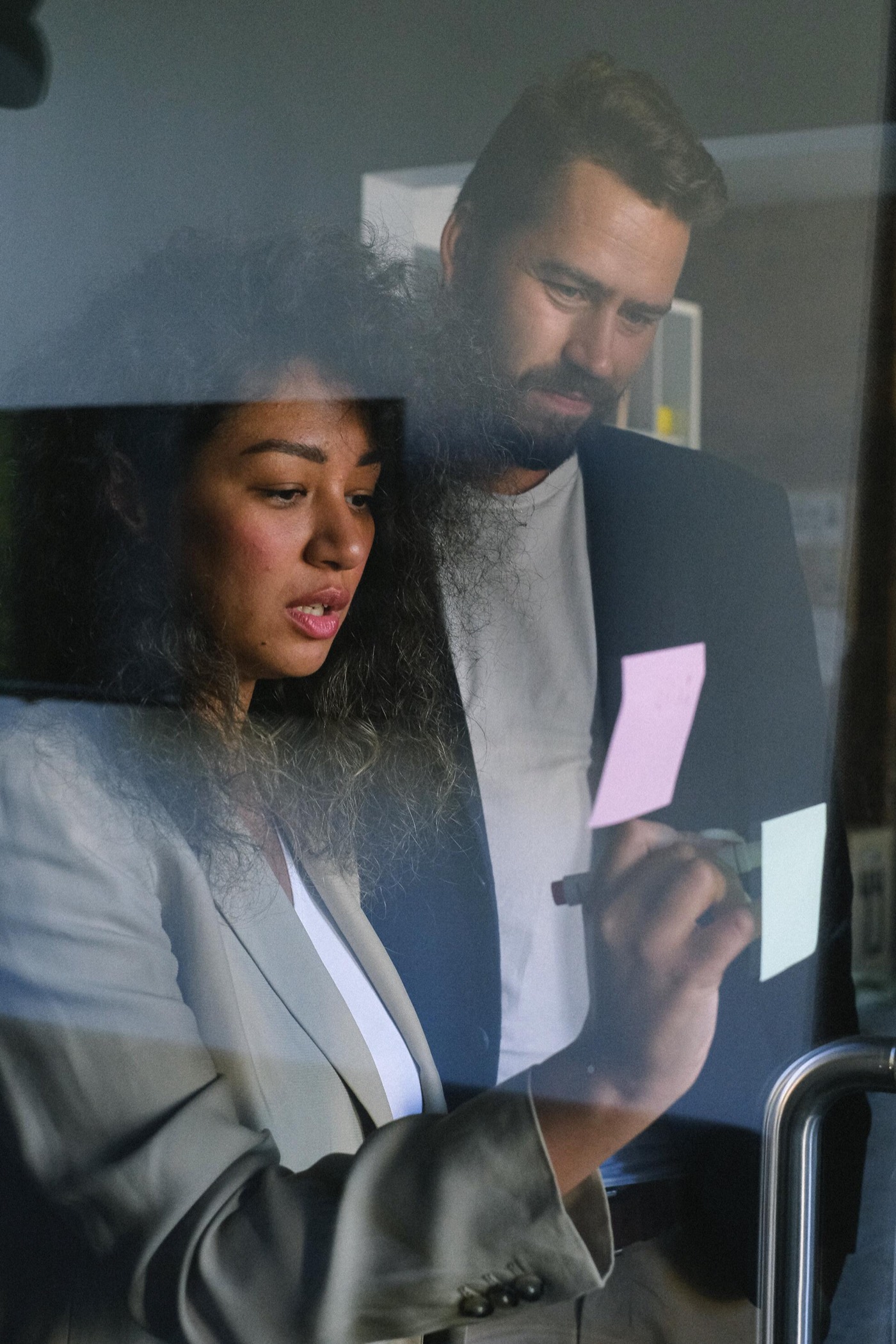 Business owner reviewing her new brand on her phone