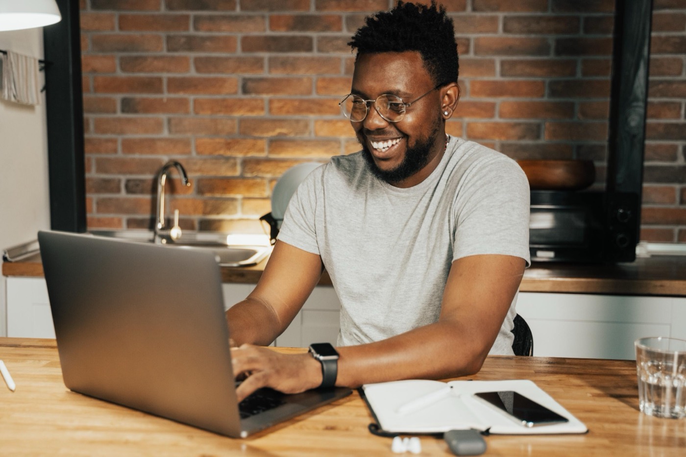 Founder working from a home kitchen table